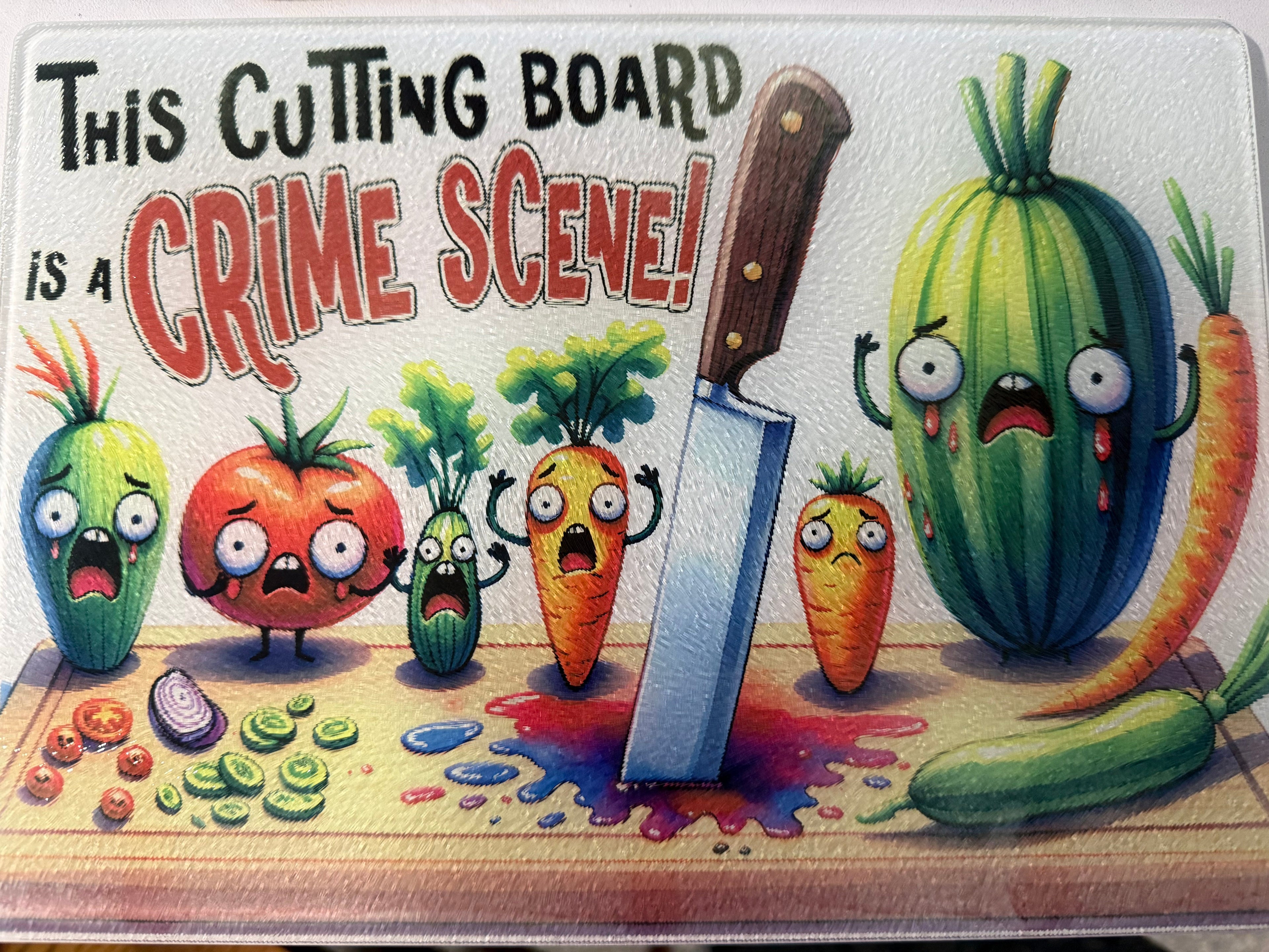 Cartoon-style cutting board with vegetables and a knife, labeled 'This Cutting Board is a Crime Scene'.